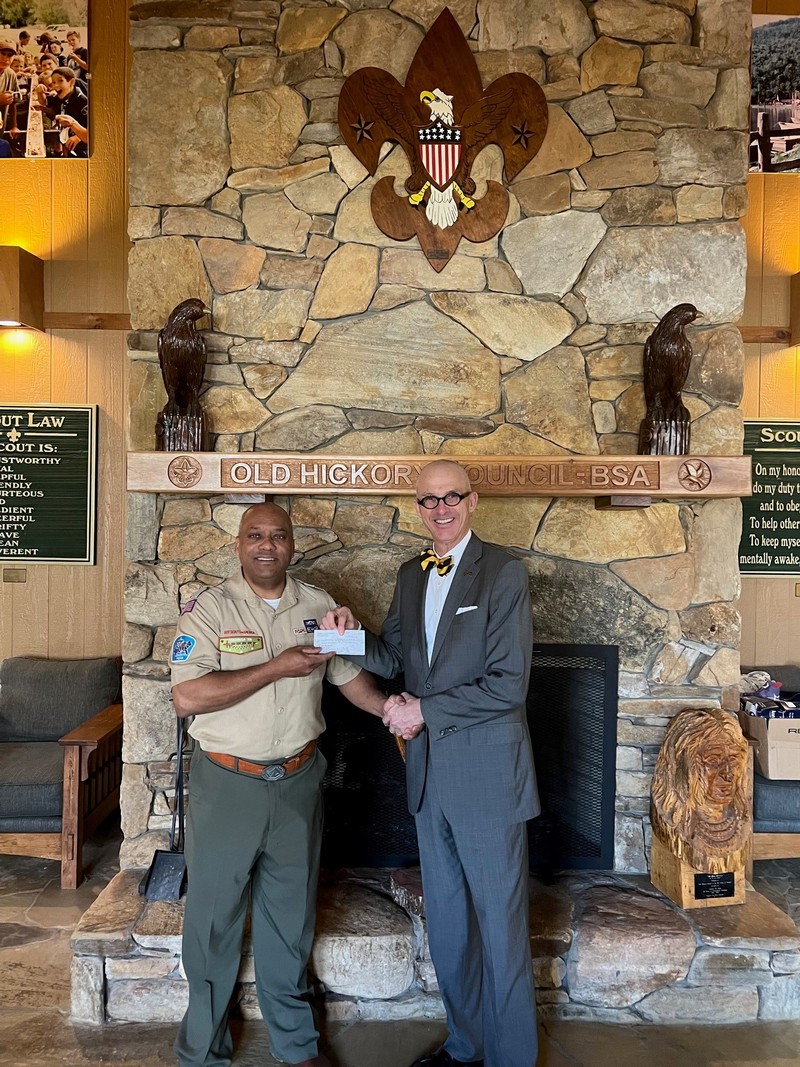 David Barksdale of Piedmont Federal presenting check to leader of Old Hictory Council - Boy Scouts of America in Winston-Salem, NC.