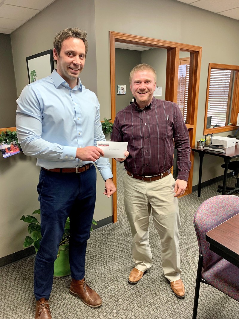 Central State Bank (IL)’s Vice President, Brian Nation, presenting the donation to Jon O’neal, CFO of the Community Foundation serving West-Central Illinois and Northeast Missouri.  The Pike County Endowment fund is a fund within the community foundation that Remedy funds supported.