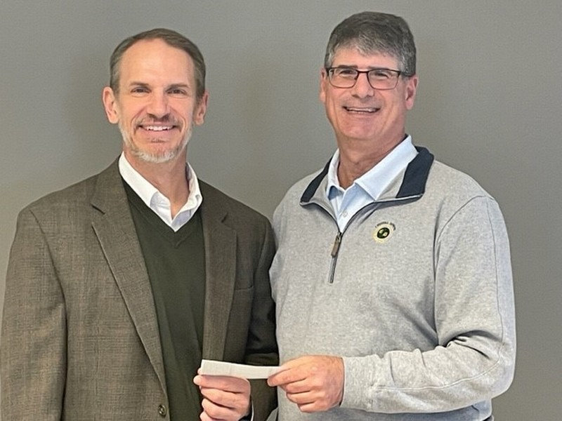 Gerard Buccino, CEO of Centrust Bank, presenting the check to Richard Koenig, Executive Director of Housing Opportunity Development Corporation in Northbrook, IL in January 2024. Richard is on the left and Gerard is on the right. 